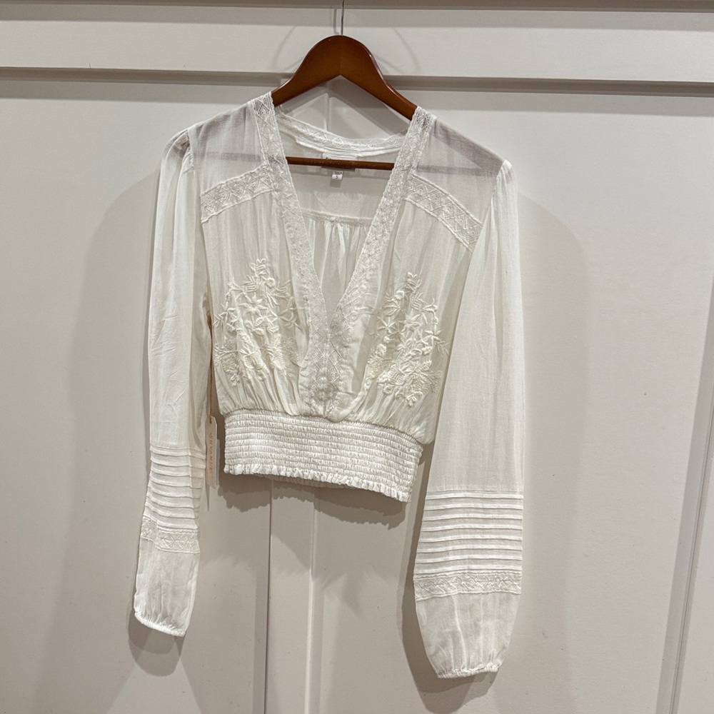 Shyanne White Embroidered Blouse with peasant style sleeves NWT